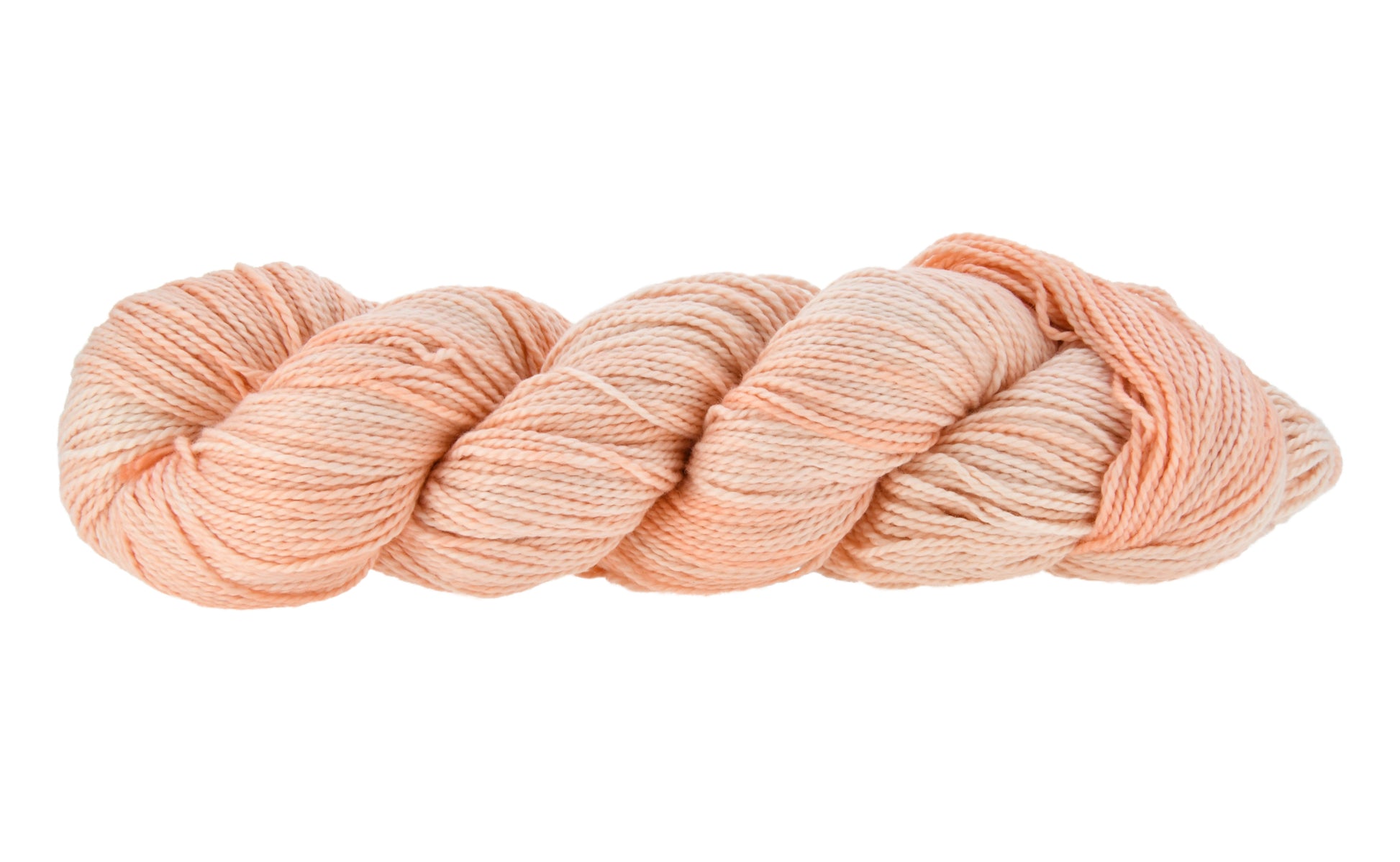 Hand-dyed DK weight yarn in Son of a Peach colorway — 100% Pima cotton skein in soft, peachy tones with warm undertones, twisted in a classic hank to highlight smooth 2-ply texture
