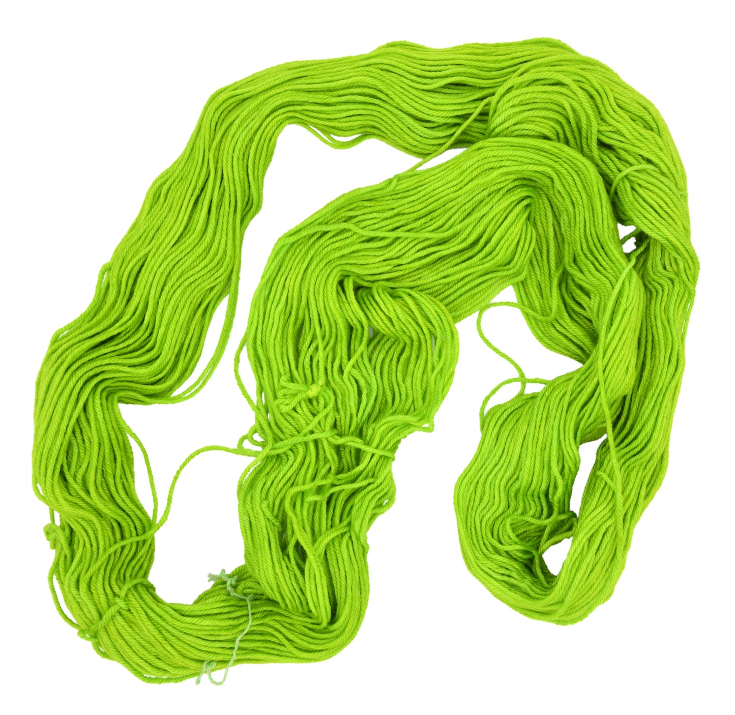 An unfolded skein of Barn Yarn hand-dyed DK weight yarn in colorway Get in Lime - a bold lime green shade, perfect for playful knitting and crochet projects.