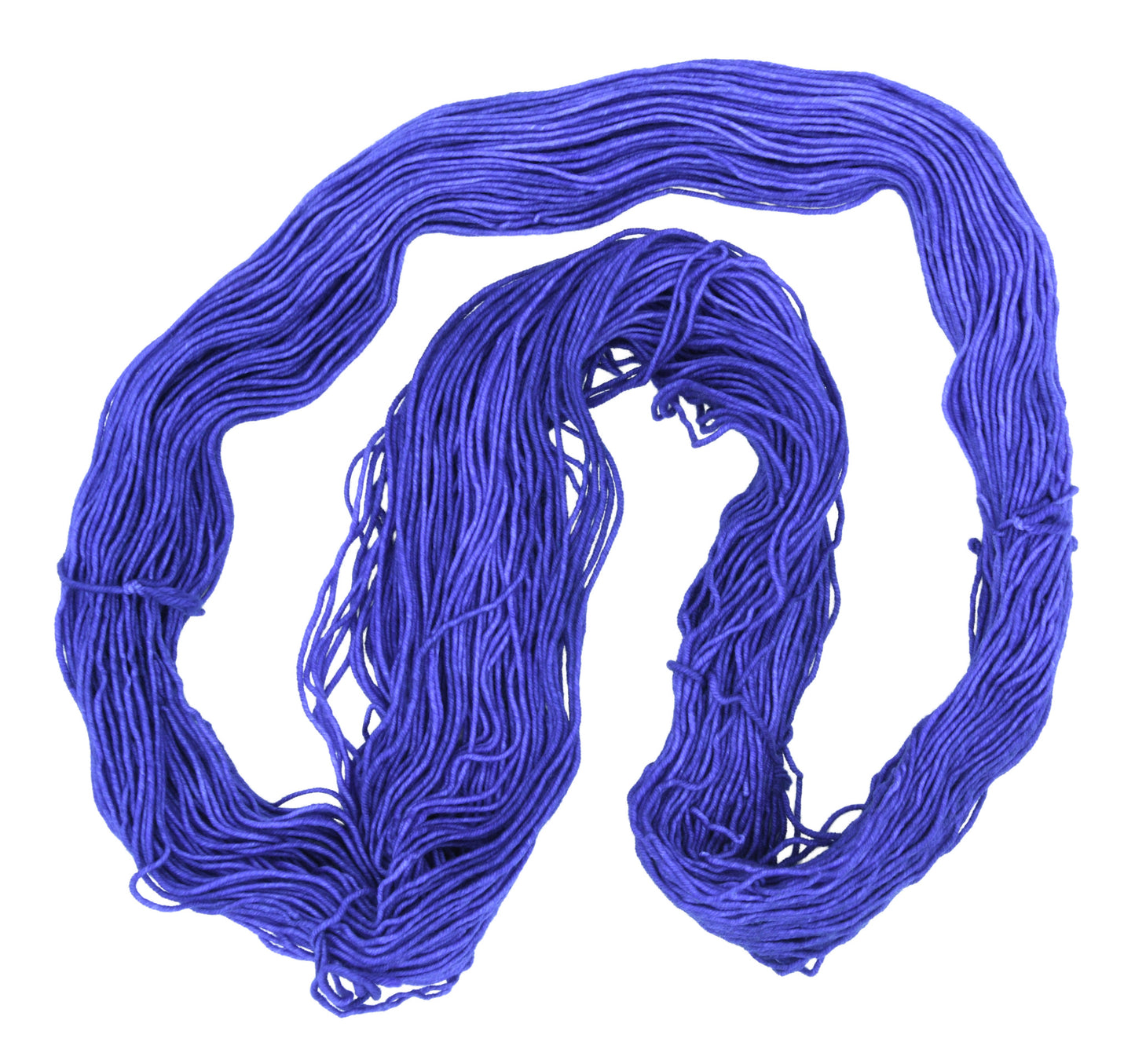 An unfolded skein of Barn Yarn DK weight yarn in colorway Lavender; inspired by the lavender flower, perfect for knitting and crochet projects.