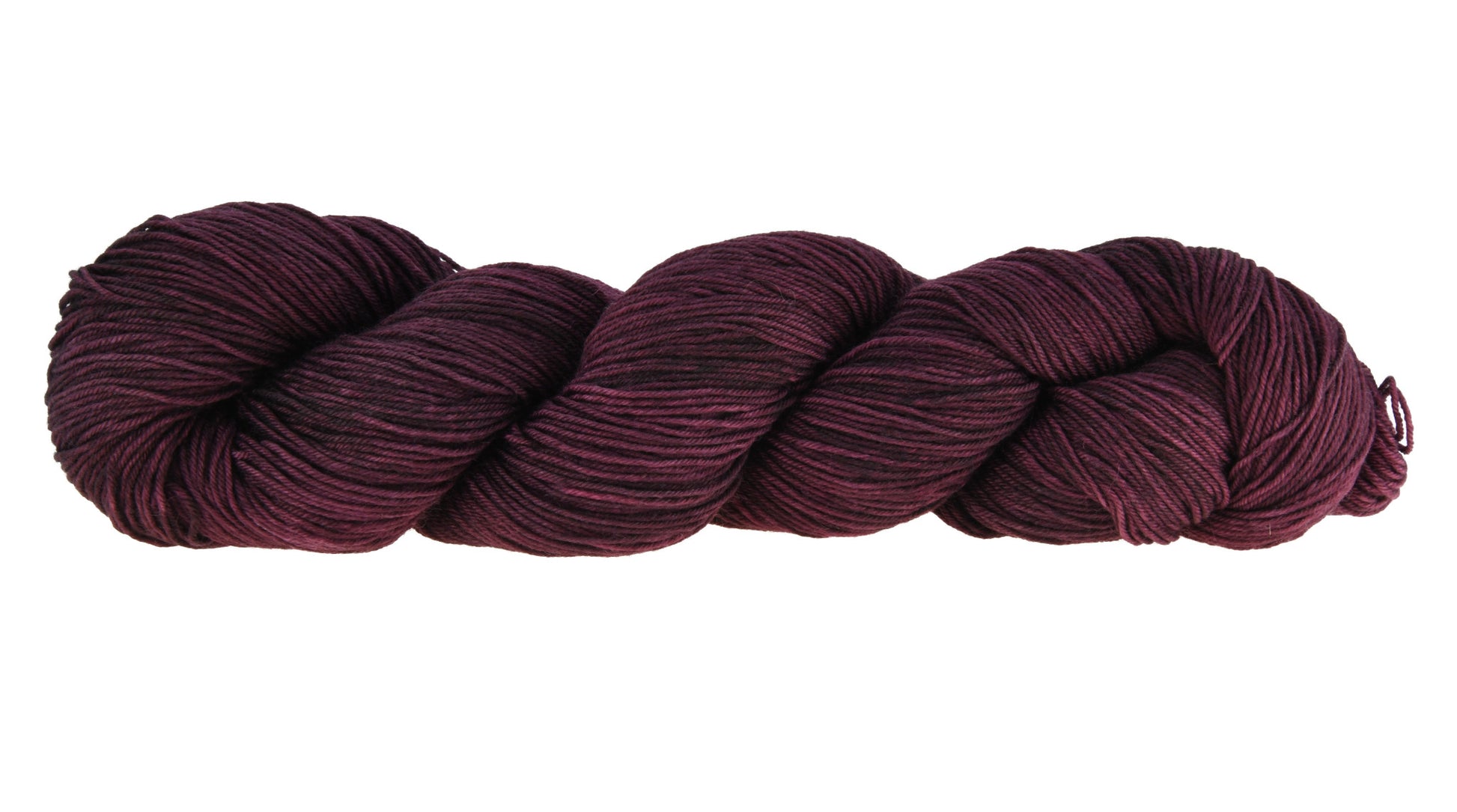 A twisted skein of Barn Yarn hand-dyed fingering weight yarn in colorway Plum; a rich, deep purple shade, perfect for sophisticated knitting and crochet projects.