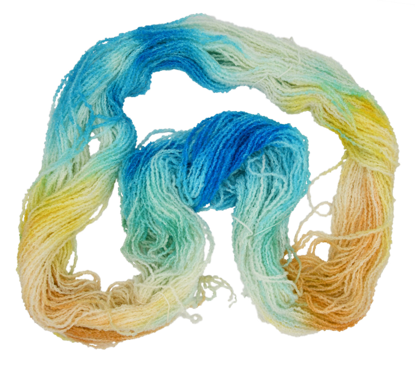 An unfolded skein of Barn Yarn hand-dyed boucle DK weight yarn in colorway Down by the Seaside with breezy blues, sandy neutrals, and sea-glass greens, perfect knitting and crochet.