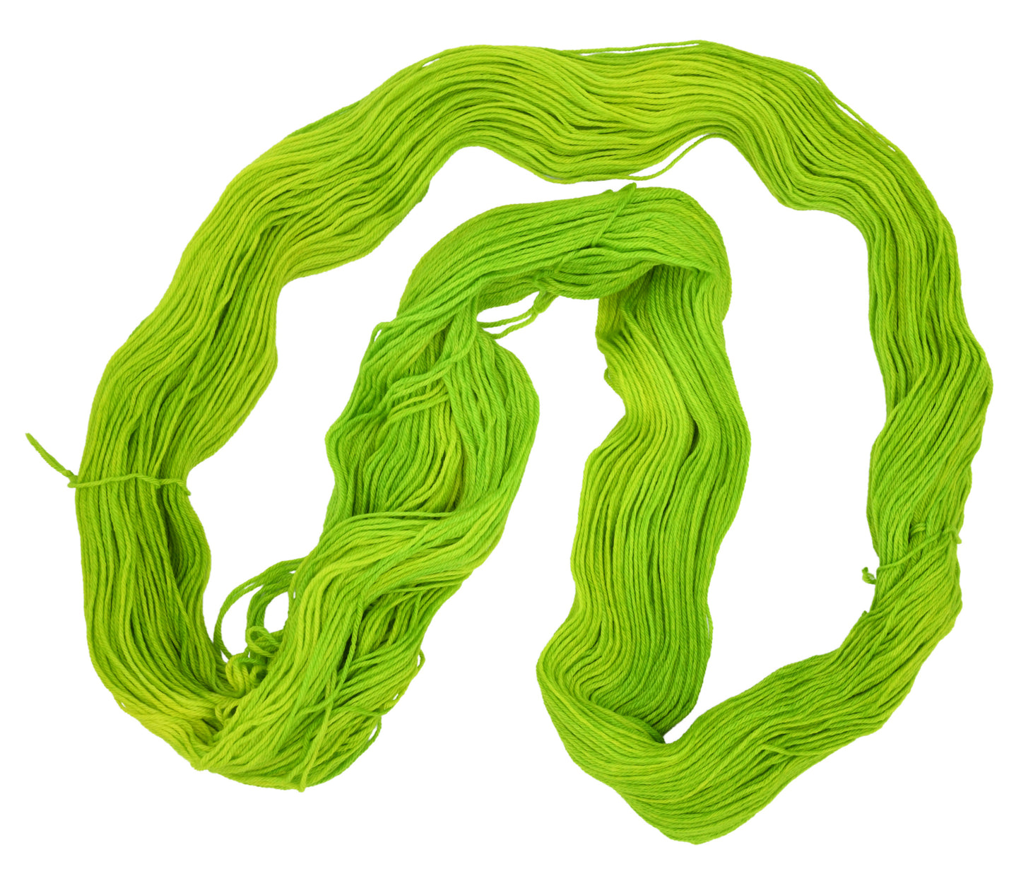 An unfolded skein of Barn Yarn hand-dyed merino-cashmere-nylon yarn in colorway Get in Lime - a bold lime green shade, perfect for playful knitting and crochet projects.