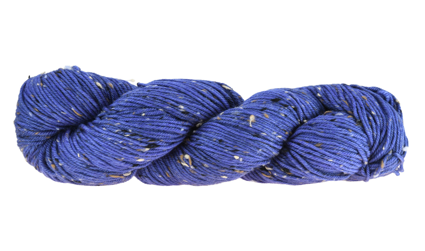 A twisted skein of Barn Yarn tweed DK weight yarn in colorway Lavender; inspired by the lavender flower, perfect for knitting and crochet projects.
