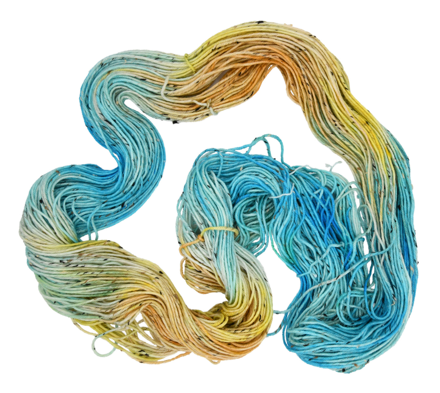 An unfolded skein of Barn Yarn hand-dyed tweed DK weight yarn in colorway Down by the Seaside with breezy blues, sandy neutrals, and sea-glass greens, perfect knitting and crochet.