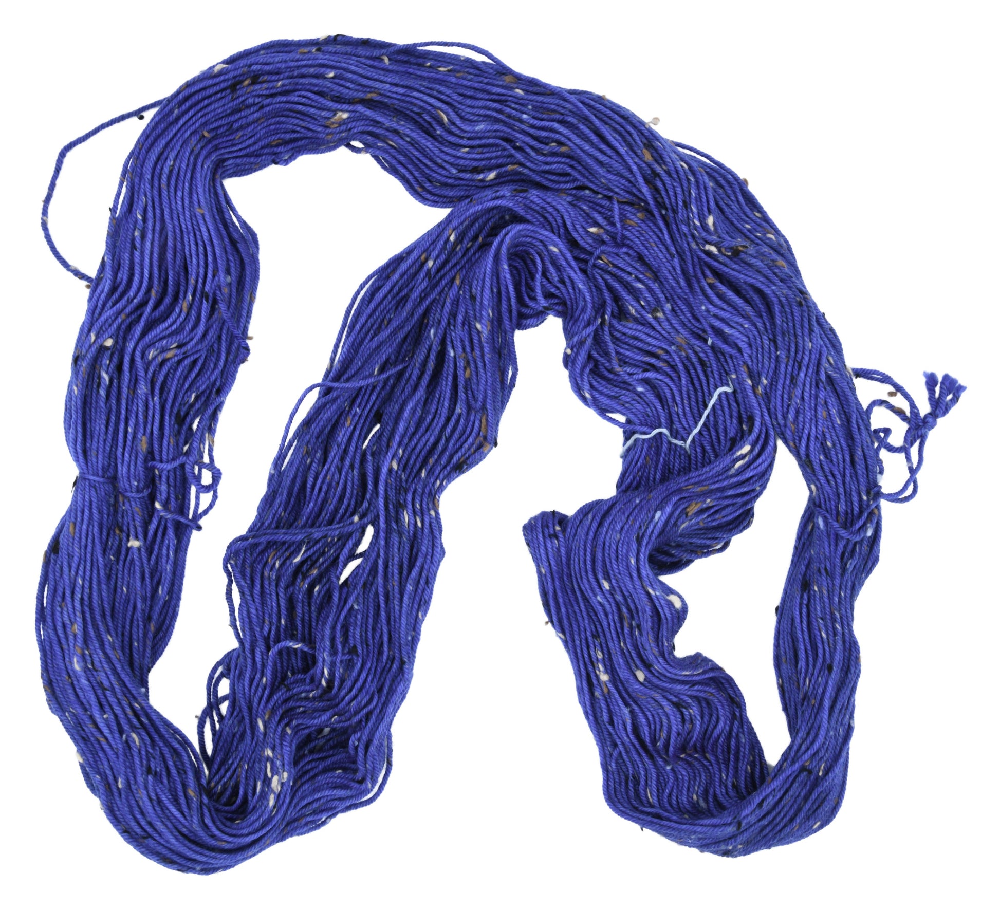An unfolded skein of Barn Yarn tweed DK weight yarn in colorway Lavender; inspired by the lavender flower, perfect for  knitting and crochet projects.