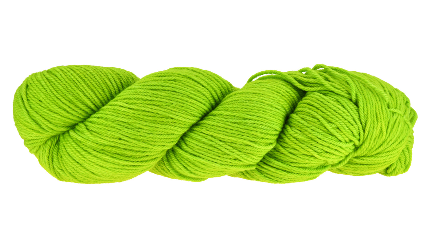 A twisted skein of Barn Yarn hand-dyed worsted weight yarn in colorway Get in Lime - a bold lime green shade, perfect for playful knitting and crochet projects.