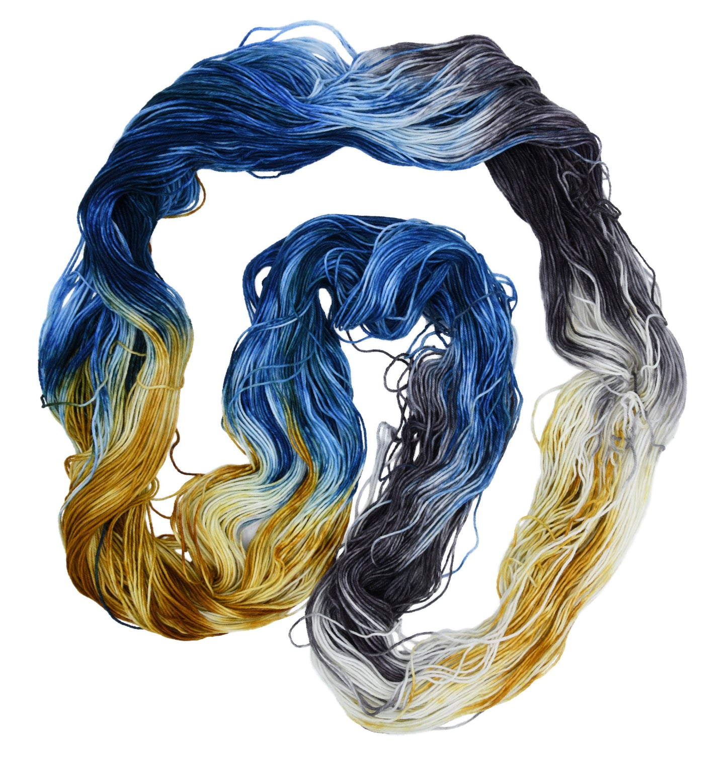 Barn-Yarn-Smoky-Mountain-fingering-weight-hand-dyed-yarn—unfolded-hank-showing-a-balanced-blend-of-dark-blue-bright-blue-toffee-and-gray-with-subtle-hand-dyed-variation.