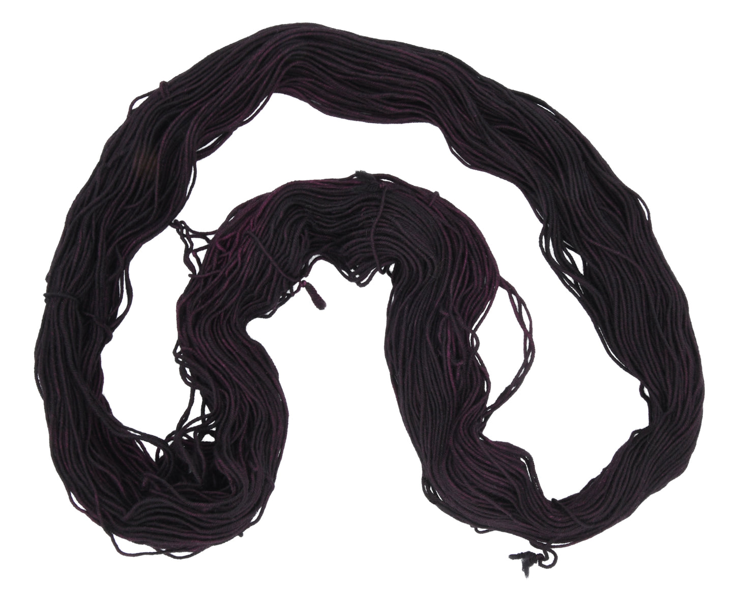 Barn Yarn unfolded skein of Shiraz sport weight hand-dyed yarn in a deep, dark burgundy, ideal for knitting and crochet projects needing rich, wine-inspired color.