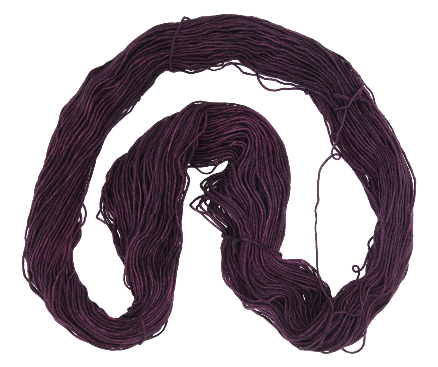 An unfolded skein of Barn Yarn hand-dyed DK weight yarn in colorway Plum; a rich, deep purple shade, perfect for sophisticated knitting and crochet projects.