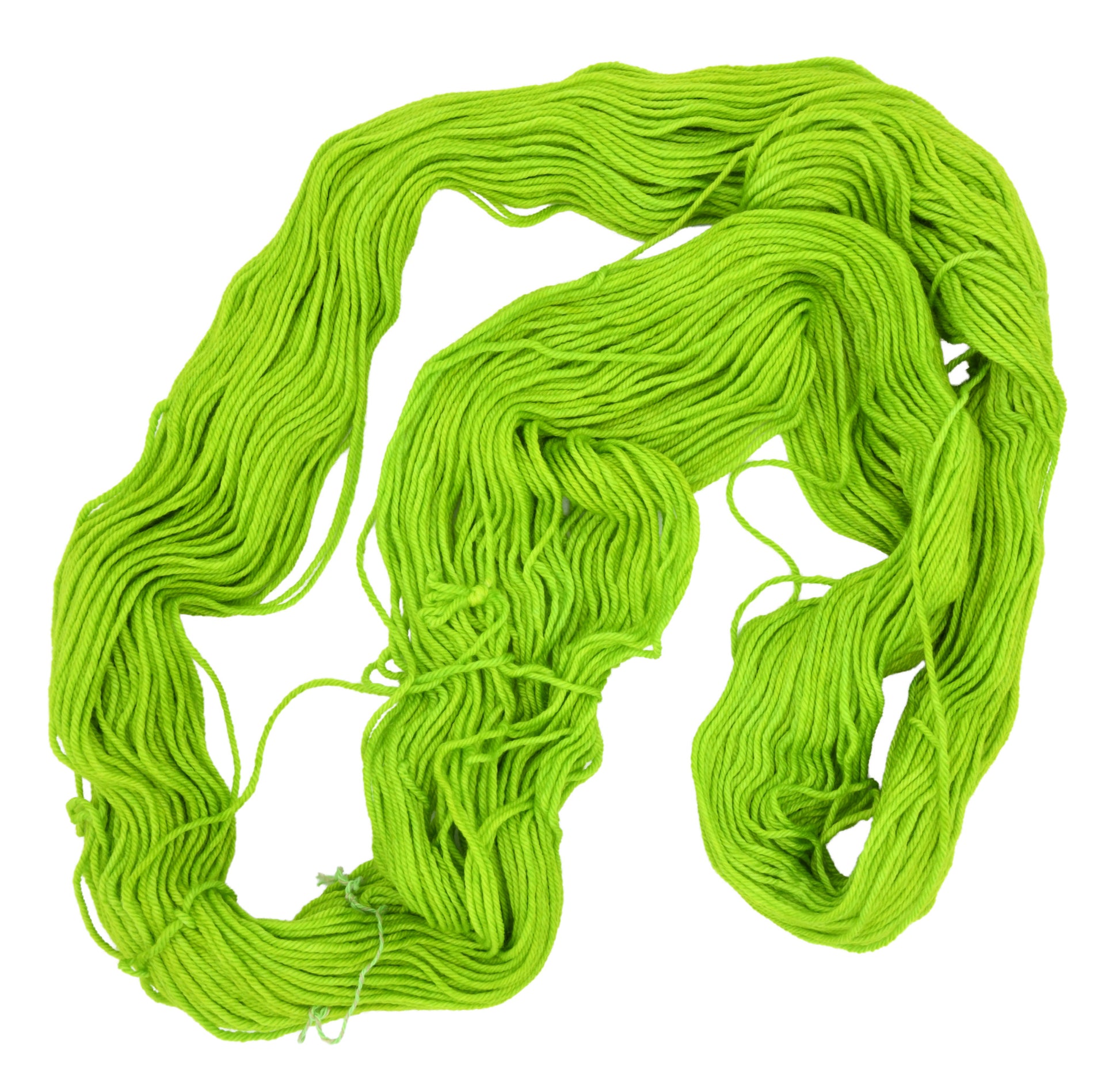 An unfolded skein of Barn Yarn hand-dyed DK weight yarn in colorway Get in Lime - a bold lime green shade, perfect for playful knitting and crochet projects.