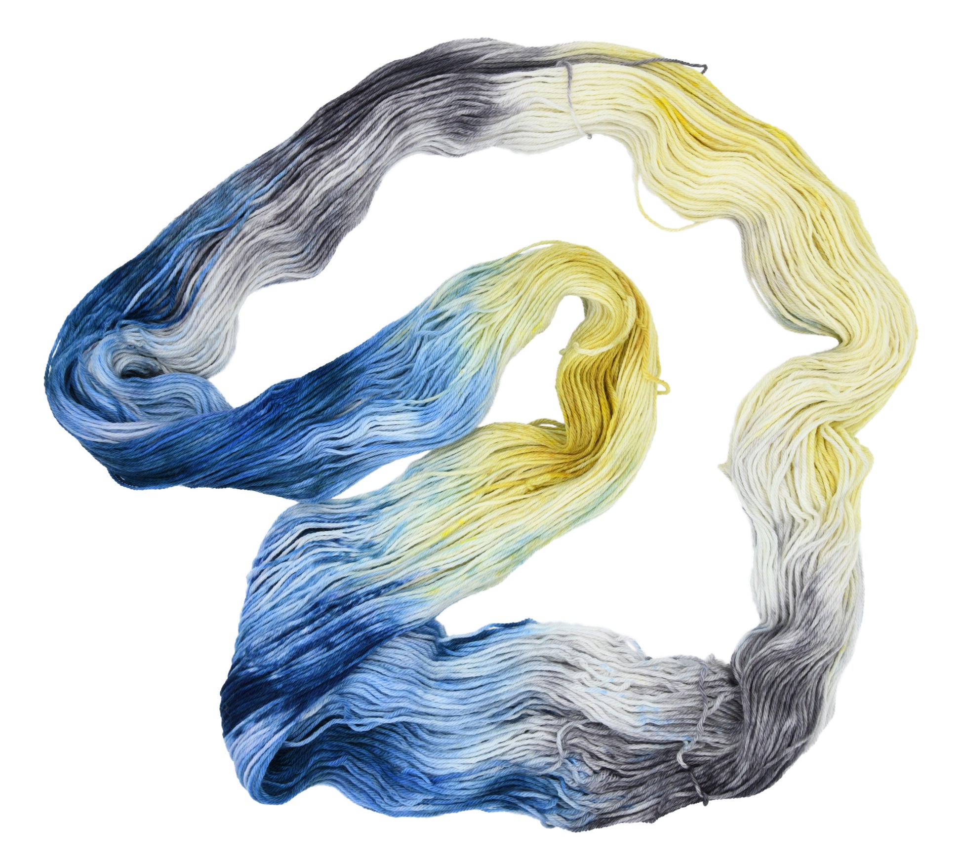 An unfolded skein of Barn Yarn hand-dyed merino-cashmere-nylon yarn in colorway Beehive featuring golden yellow, soft gray and blue tones, perfect for warm and vibrant knitting and crochet projects.