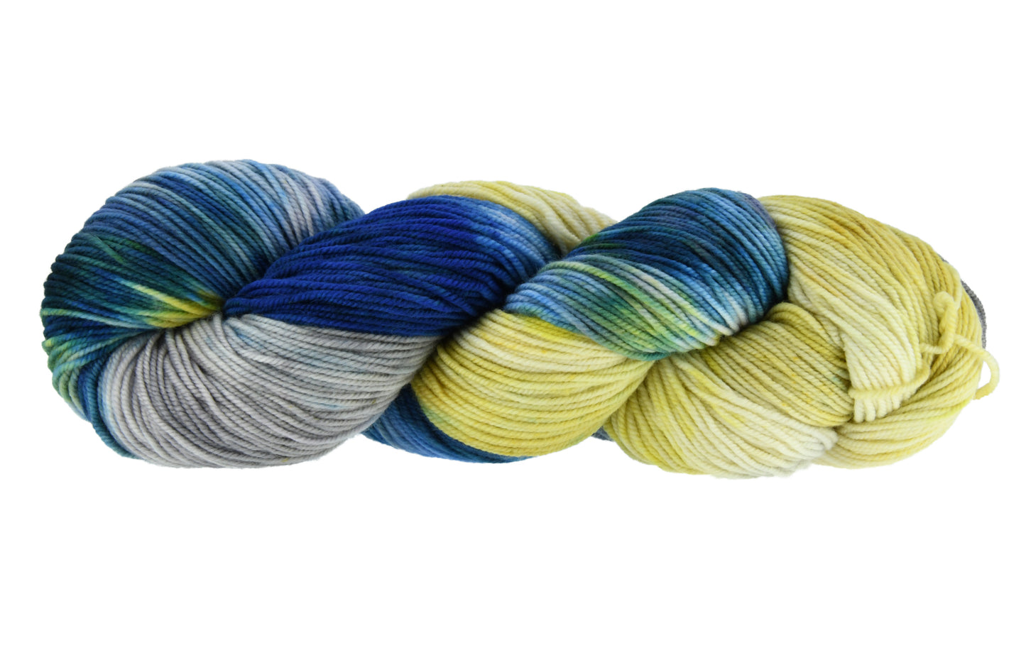 A twisted skein of Barn Yarn hand-dyed sport weight yarn in colorway Beehive featuring golden yellow, soft gray and blue tones, perfect for warm and vibrant knitting and crochet projects.