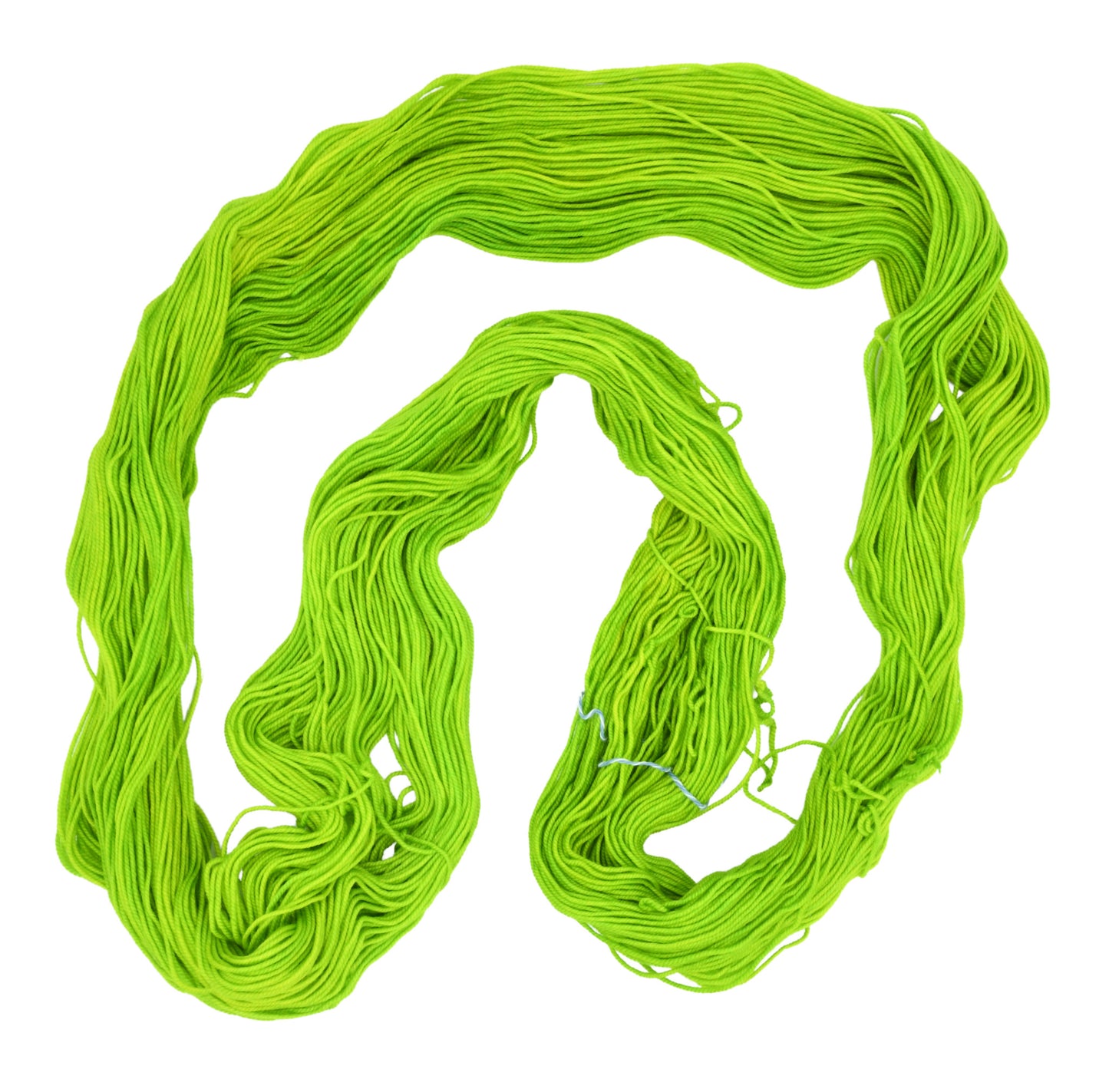 An unfolded skein of Barn Yarn hand-dyed sport weight yarn in colorway Get in Lime - a bold lime green shade, perfect for playful knitting and crochet projects.