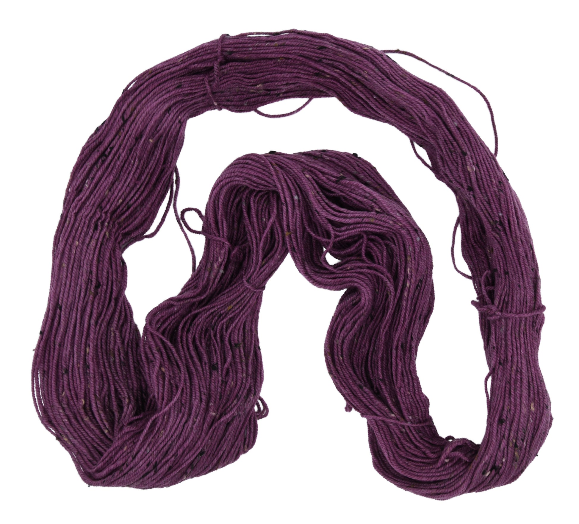 An unfolded skein of Barn Yarn hand-dyed tweed DK weight yarn in colorway Plum; a rich, deep purple shade, perfect for sophisticated knitting and crochet projects.