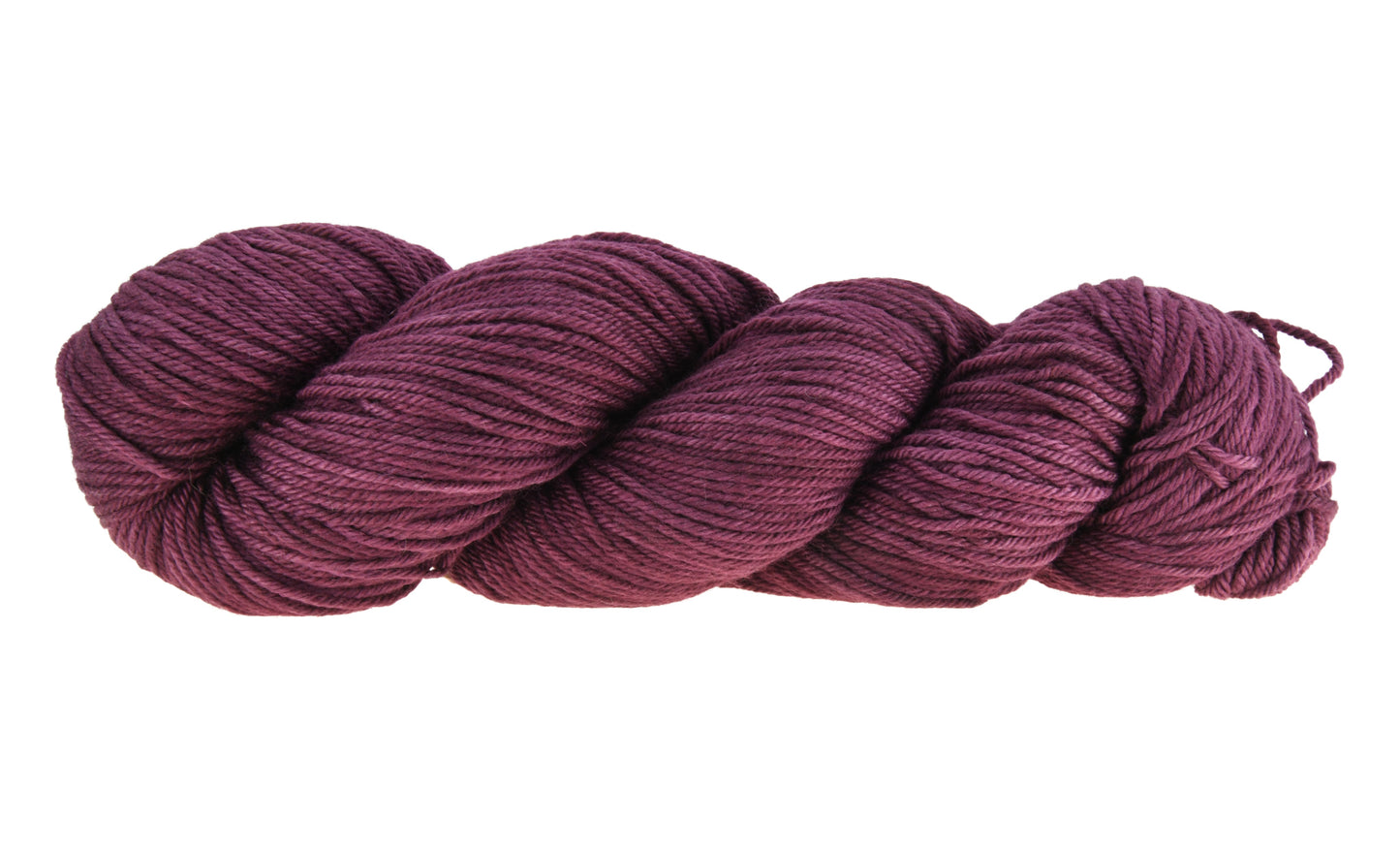 A twisted skein of Barn Yarn hand-dyed worsted weight yarn in colorway Plum; a rich, deep purple shade, perfect for sophisticated knitting and crochet projects.