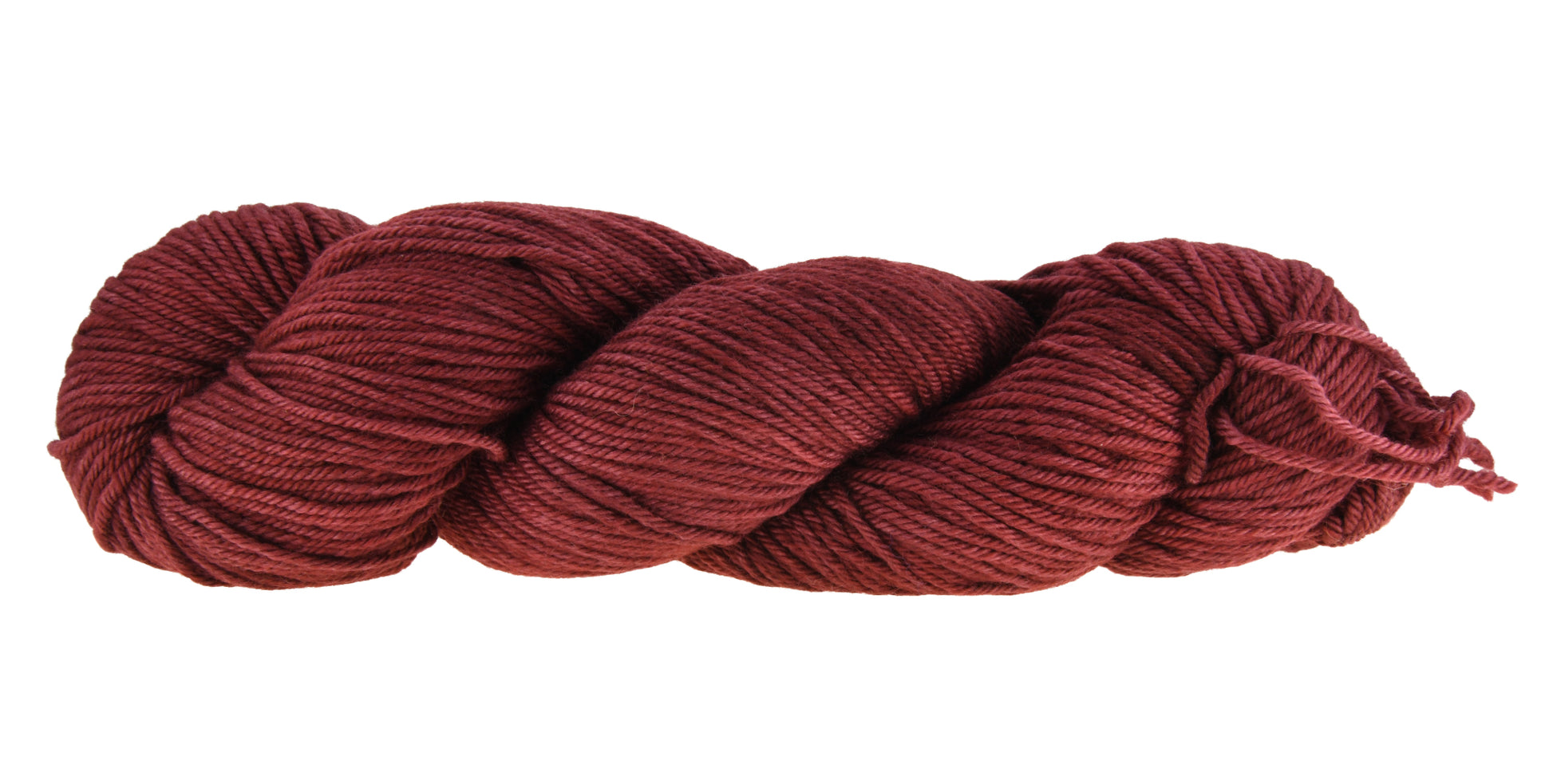 A twisted skein of Barn Yarn hand-dyed worsted weight yarn in colorway Chocolate Moose; a rich, earthy brown shade, perfect for warm and cozy knitting and crochet projects.